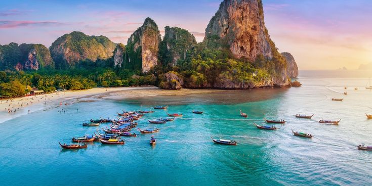 Railay beach with long tail boat in Krabi, Thailand