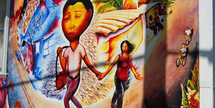 Gemälde mit Menschmotiven im Mission District in San Francisco