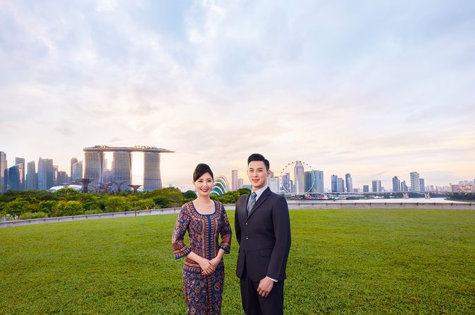 Singapore Airlines Crew and panoramic view of Singapore