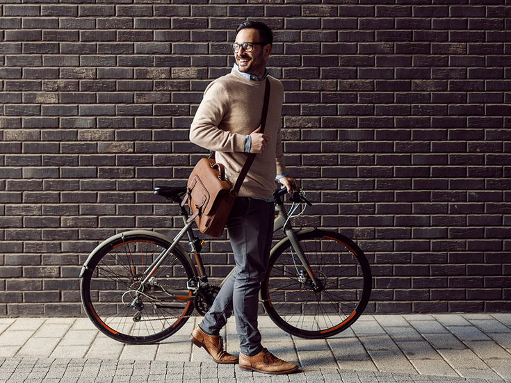 Geschäftsmann mit Fahrrad